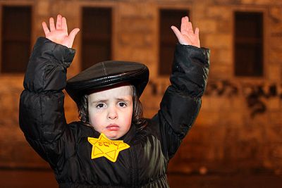 Haredi boy yellow star demo arms up mea shearim 12-31-2011